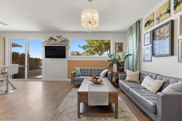 694 Value Ridge Ave, Henderson, NV 89012 - living area with a chandelier and wood finished floors