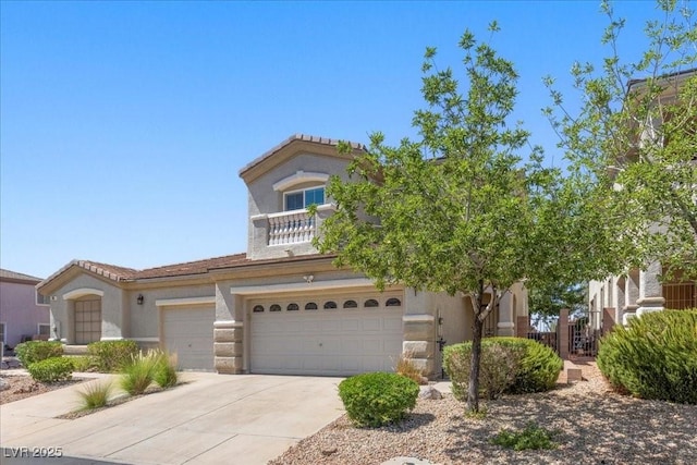 694 Value Ridge Ave, Henderson, NV 89012 - view of front of house featuring driveway, an attached garage, and stucco siding