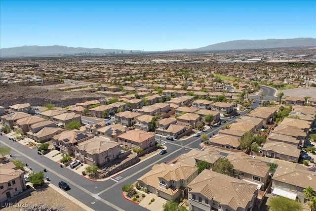 694 Value Ridge Ave, Henderson, NV 89012 - aerial view of property's location with a mountain backdrop and nearby suburban area