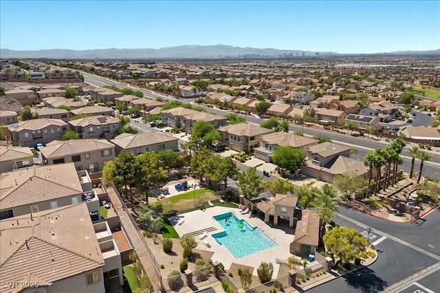 694 Value Ridge Ave, Henderson, NV 89012 - aerial view of residential area with a pool and mountains