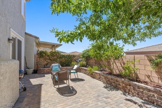 694 Value Ridge Ave, Henderson, NV 89012 - fenced backyard featuring a patio area