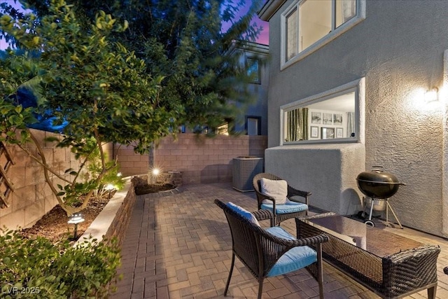 694 Value Ridge Ave, Henderson, NV 89012 - fenced backyard with a patio, a grill, and a fire pit