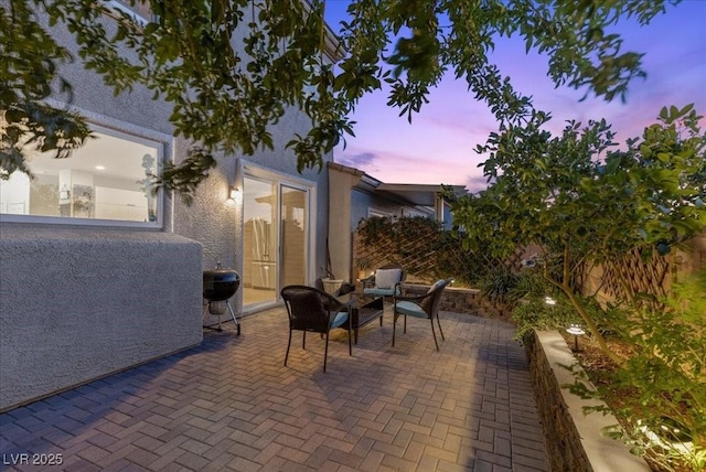 694 Value Ridge Ave, Henderson, NV 89012 - patio terrace at dusk with a patio