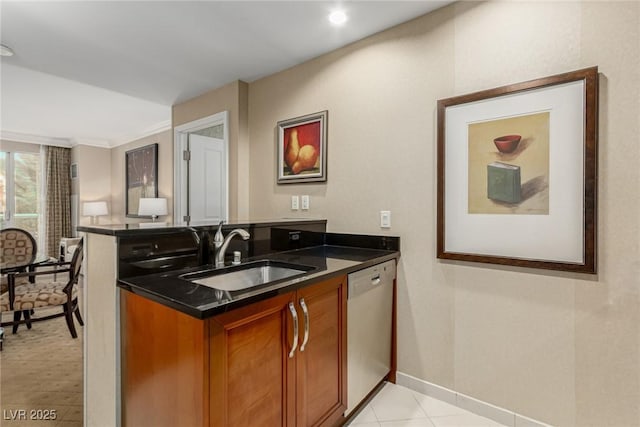 135 E Harmon Ave Unit 2702, Las Vegas, NV 89109 - kitchen featuring brown cabinets, stainless steel dishwasher, a peninsula, and ornamental molding