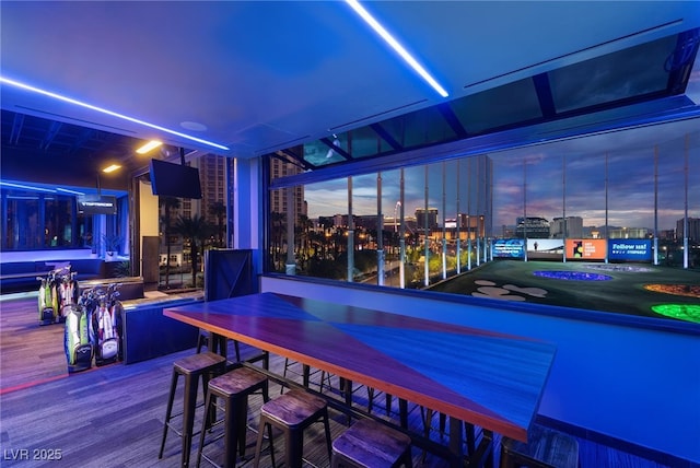 135 E Harmon Ave Unit 2702, Las Vegas, NV 89109 - rec room featuring a bar and wood finished floors