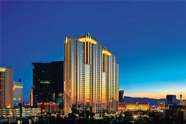 135 E Harmon Ave Unit 2702, Las Vegas, NV 89109 - property at dusk featuring a city view