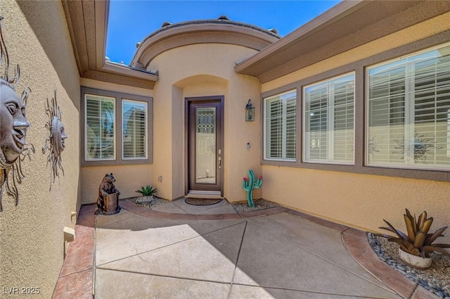2779 Kindeace Ave, Henderson, NV 89044 - entrance to property with stucco siding and a patio