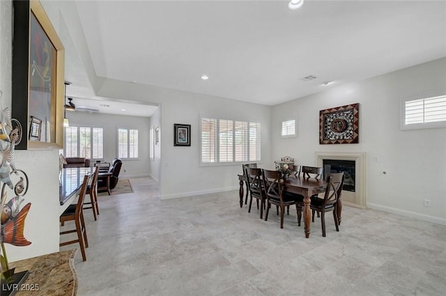 2779 Kindeace Ave, Henderson, NV 89044 - dining space with recessed lighting and a glass covered fireplace