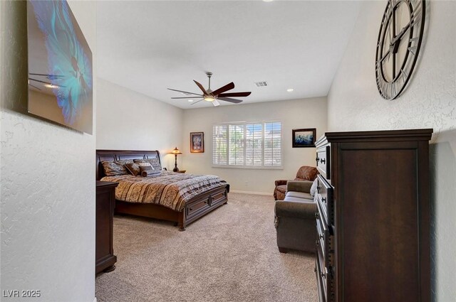 2779 Kindeace Ave, Henderson, NV 89044 - bedroom with light carpet, ceiling fan, recessed lighting, and a textured wall