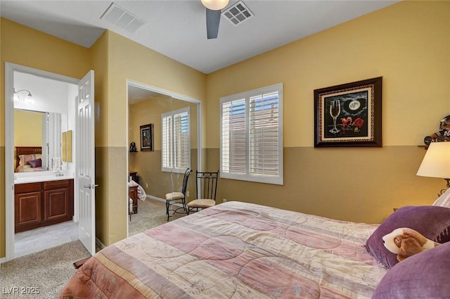 2779 Kindeace Ave, Henderson, NV 89044 - bedroom featuring carpet flooring, ensuite bathroom, and ceiling fan