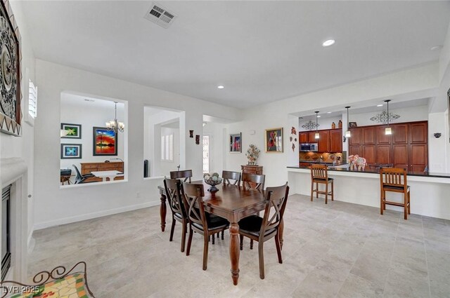 2779 Kindeace Ave, Henderson, NV 89044 - dining room with a chandelier and recessed lighting