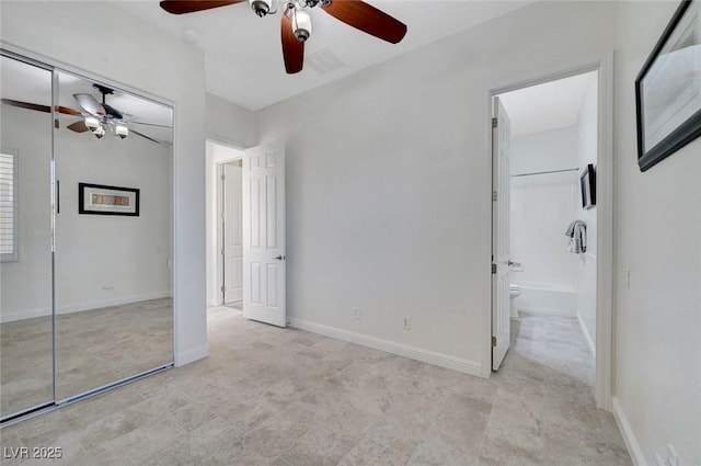 2779 Kindeace Ave, Henderson, NV 89044 - unfurnished bedroom with a closet, ensuite bathroom, and a ceiling fan