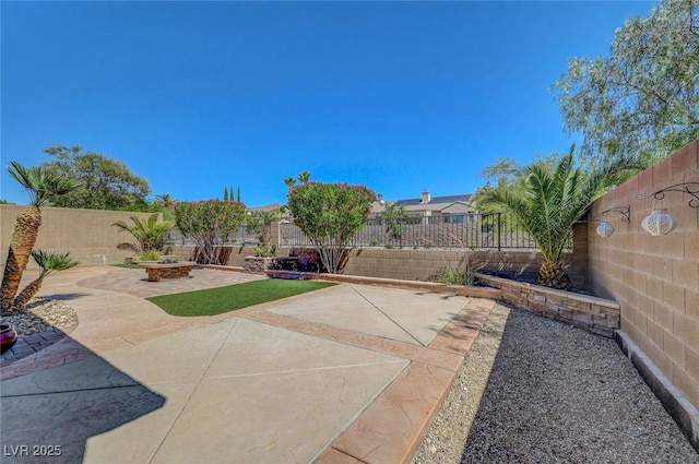 2779 Kindeace Ave, Henderson, NV 89044 - fenced backyard featuring a patio
