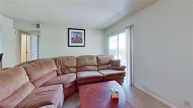 4990 River Glen Dr Unit 171, Las Vegas, NV 89103 - living area with baseboards and light colored carpet
