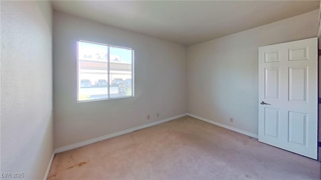 4990 River Glen Dr Unit 171, Las Vegas, NV 89103 - unfurnished room with light colored carpet and baseboards