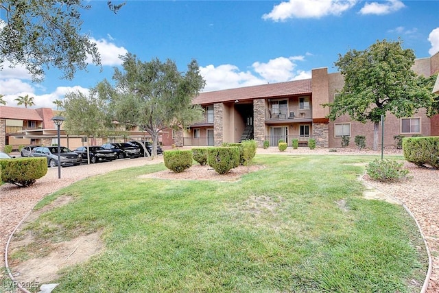 4990 River Glen Dr Unit 171, Las Vegas, NV 89103 - view of home's community featuring a yard