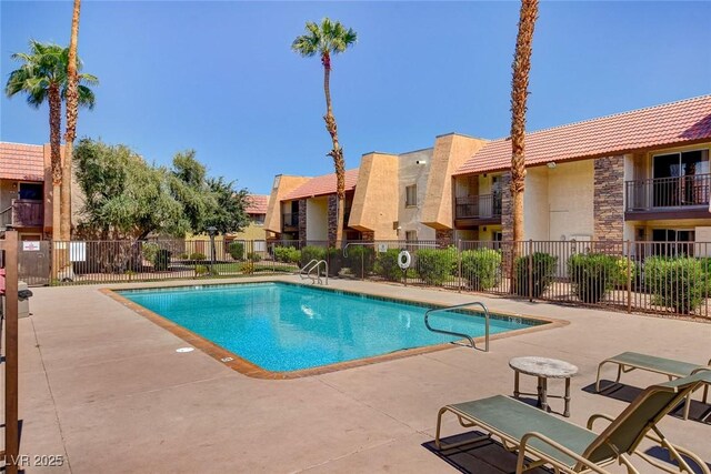 4990 River Glen Dr Unit 171, Las Vegas, NV 89103 - community pool with a patio and a residential view