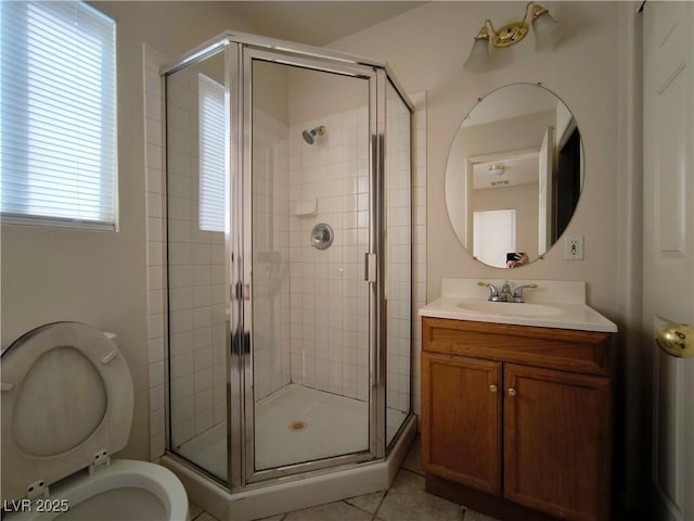 9693 Bighorn Island Ave, Las Vegas, NV 89148 - full bathroom featuring vanity, a stall shower, and tile patterned flooring