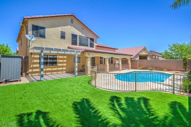 7619 Comanche Canyon Ave, Las Vegas, NV 89113 - rear view of house with stucco siding, a fenced backyard, a pergola, a patio, and a tile roof