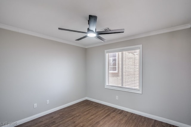 7619 Comanche Canyon Ave, Las Vegas, NV 89113 - spare room featuring dark wood-style flooring, ceiling fan, and crown molding