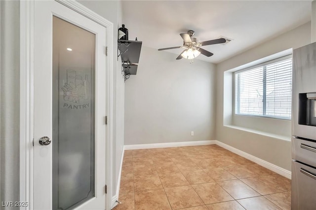 5732 Hornbrook St, North Las Vegas, NV 89031 - unfurnished room featuring a ceiling fan and light tile patterned floors