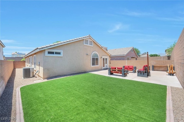 5732 Hornbrook St, North Las Vegas, NV 89031 - rear view of property featuring a patio, a fenced backyard, stucco siding, and an outdoor hangout area