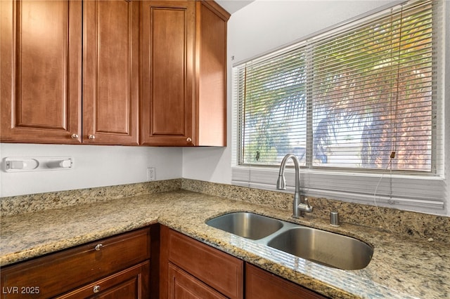 1901 Manhattan Dr, Las Vegas, NV 89106 - kitchen featuring a sink and light stone counters