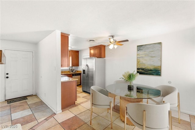 1901 Manhattan Dr, Las Vegas, NV 89106 - dining space featuring ceiling fan and light tile patterned floors