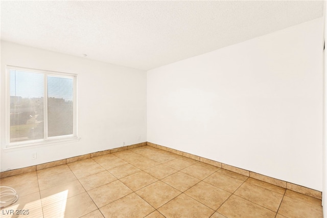 3668 Villa Knolls E Dr, Las Vegas, NV 89120 - unfurnished room with baseboards and light tile patterned floors