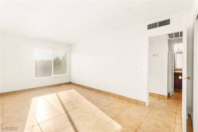 3668 Villa Knolls E Dr, Las Vegas, NV 89120 - empty room with light tile patterned flooring and baseboards