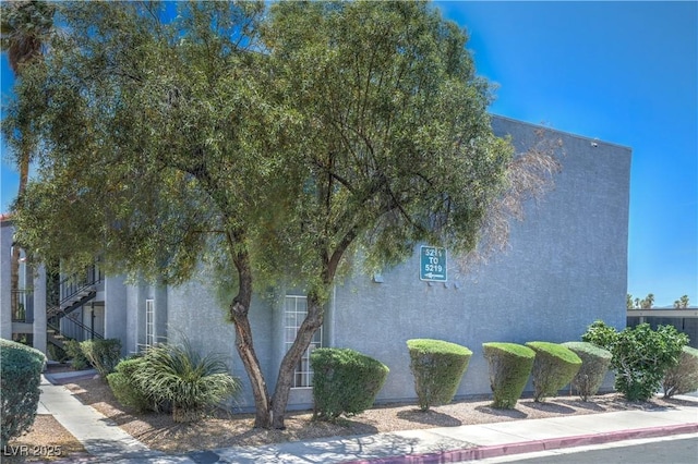 5219 Caliente St Unit 11, Las Vegas, NV 89119 - view of home's exterior with stucco siding