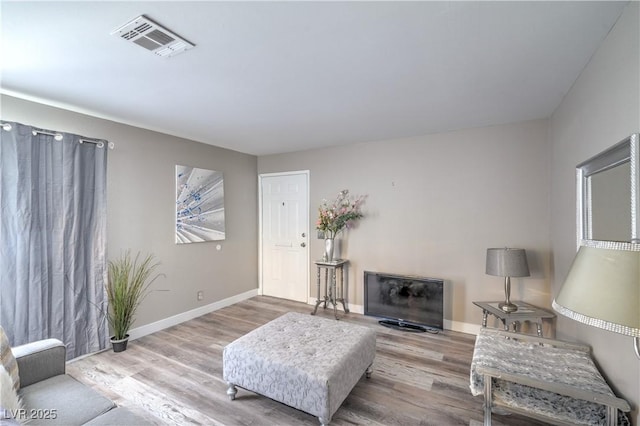 5219 Caliente St Unit 11, Las Vegas, NV 89119 - living area featuring wood finished floors and baseboards