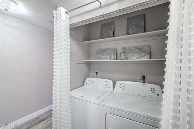 5219 Caliente St Unit 11, Las Vegas, NV 89119 - laundry area with washing machine and dryer and wood finished floors