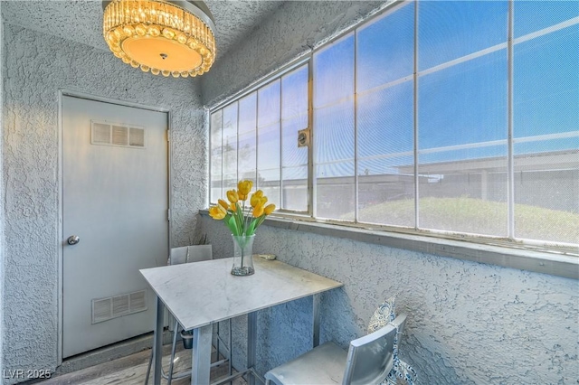 5219 Caliente St Unit 11, Las Vegas, NV 89119 - dining area with wood finished floors