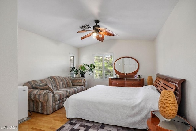 9357 Golden Timber Ln, Las Vegas, NV 89117 - bedroom with lofted ceiling, wood finished floors, and ceiling fan