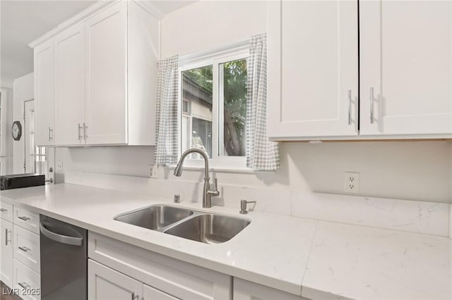 4027 Maple Hill Rd, Las Vegas, NV 89115 - kitchen featuring stainless steel dishwasher and white cabinets