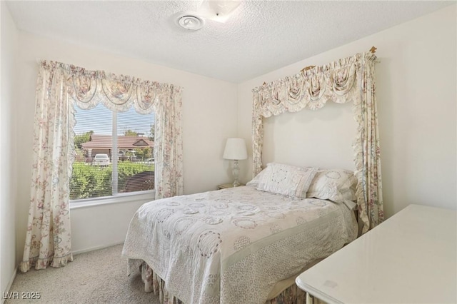 4027 Maple Hill Rd, Las Vegas, NV 89115 - carpeted bedroom featuring a textured ceiling