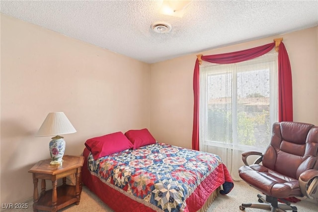 4027 Maple Hill Rd, Las Vegas, NV 89115 - bedroom with carpet floors and a textured ceiling