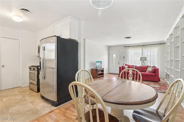4027 Maple Hill Rd, Las Vegas, NV 89115 - dining room featuring light tile patterned floors