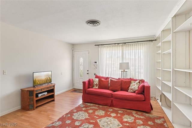 4027 Maple Hill Rd, Las Vegas, NV 89115 - living area featuring wood finished floors