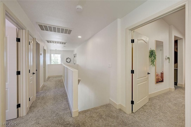 189 Andada Dr, Henderson, NV 89012 - hall featuring an upstairs landing, carpet, and recessed lighting