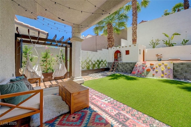189 Andada Dr, Henderson, NV 89012 - fenced backyard featuring a patio area, a pergola, and an outdoor living space