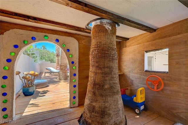 189 Andada Dr, Henderson, NV 89012 - detailed view of beamed ceiling, wood walls, and wood finished floors