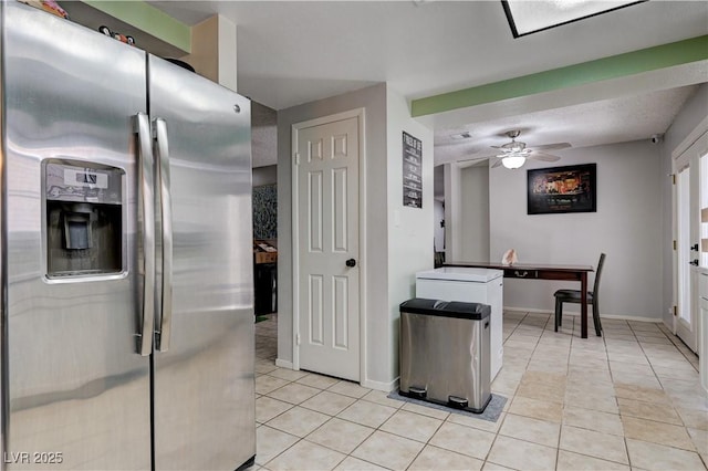 3928 Edgemoor Way, Las Vegas, NV 89121 - kitchen with stainless steel fridge, light tile patterned floors, and a ceiling fan