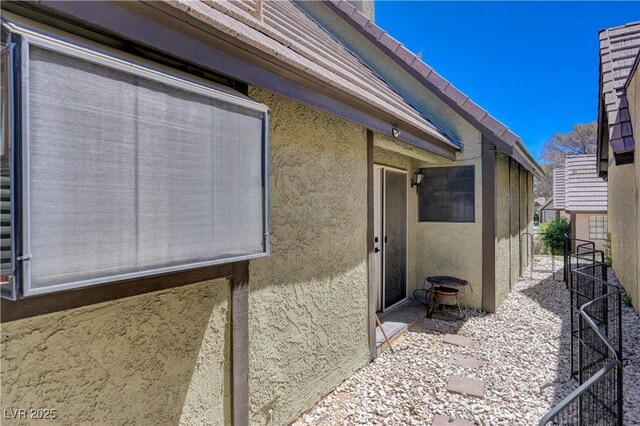 3928 Edgemoor Way, Las Vegas, NV 89121 - view of side of home with stucco siding