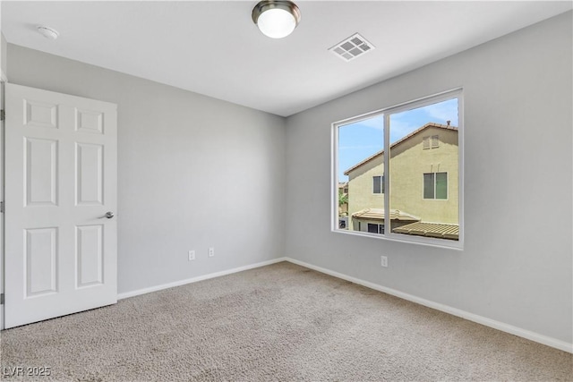 6678 Crystal Run Ln, Las Vegas, NV 89122 - carpeted spare room with baseboards and a smoke detector