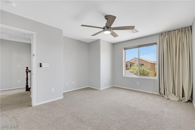 6678 Crystal Run Ln, Las Vegas, NV 89122 - unfurnished room featuring a ceiling fan, light colored carpet, and a smoke detector