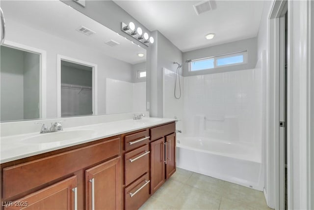 6678 Crystal Run Ln, Las Vegas, NV 89122 - bathroom with bathing tub / shower combination, double vanity, and tile patterned flooring