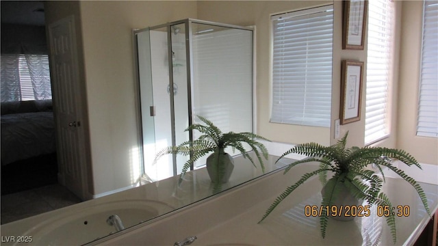 1504 Andrew David Ave, North Las Vegas, NV 89086 - bathroom with connected bathroom, plenty of natural light, and a shower stall