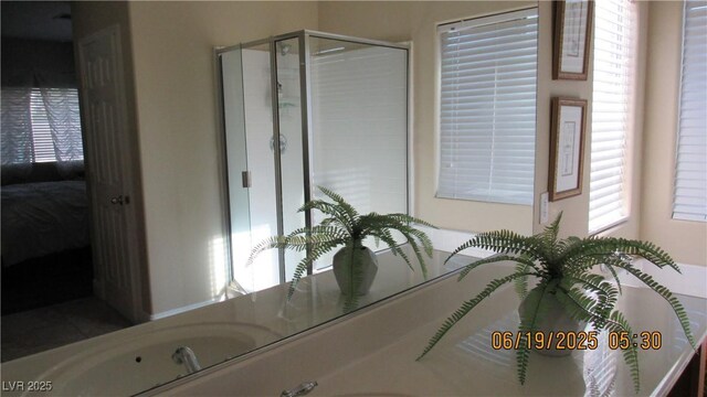 1504 Andrew David Ave, North Las Vegas, NV 89086 - ensuite bathroom featuring plenty of natural light and a shower stall